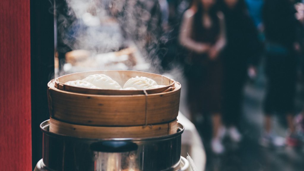 Steaming dumplings at a market in China.