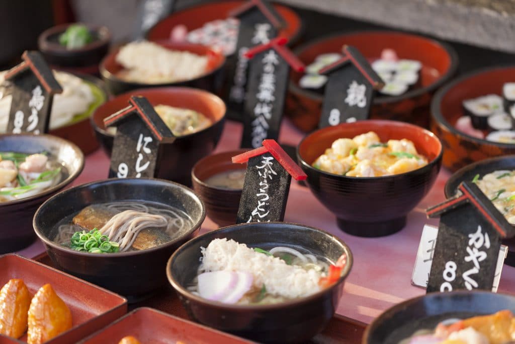 Find local delicacies at Kyoto's traditional food markets, Japan.