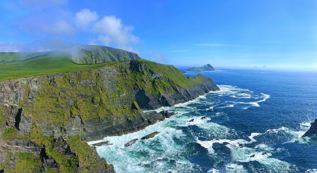 A panoramic and stunning view of the Kerry Cliffs The Ring of Kerry, Ireland // Panoramic coastal road