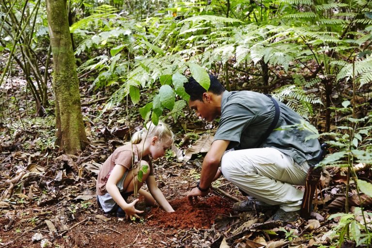 Lapa Rios little girl planting tree