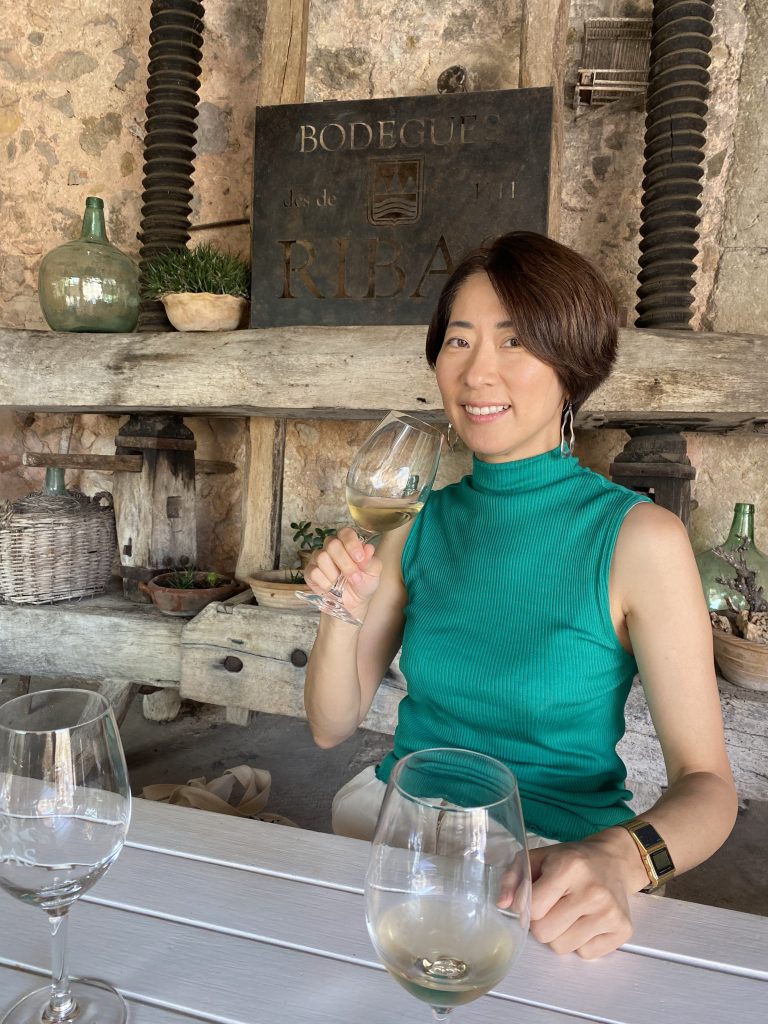Yuriko Takatori tasting wine in Mallorca