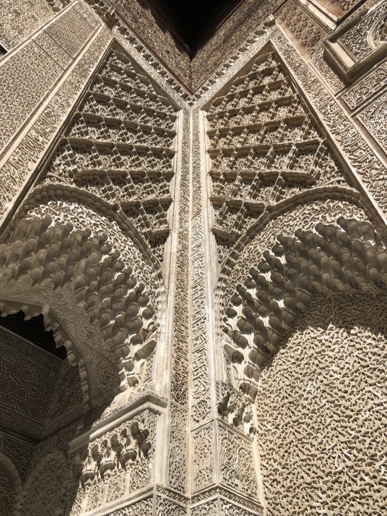 Beautiful details at the entrance of a madrassa in Fez, Morocco.