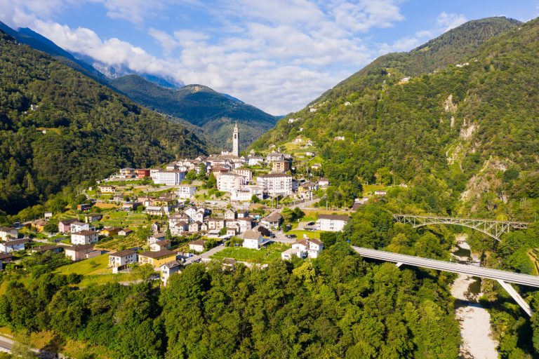 Picturesque summer drone view of alpine village Intragna surrounded by the Alps, Canton Ticino, Switzerland.