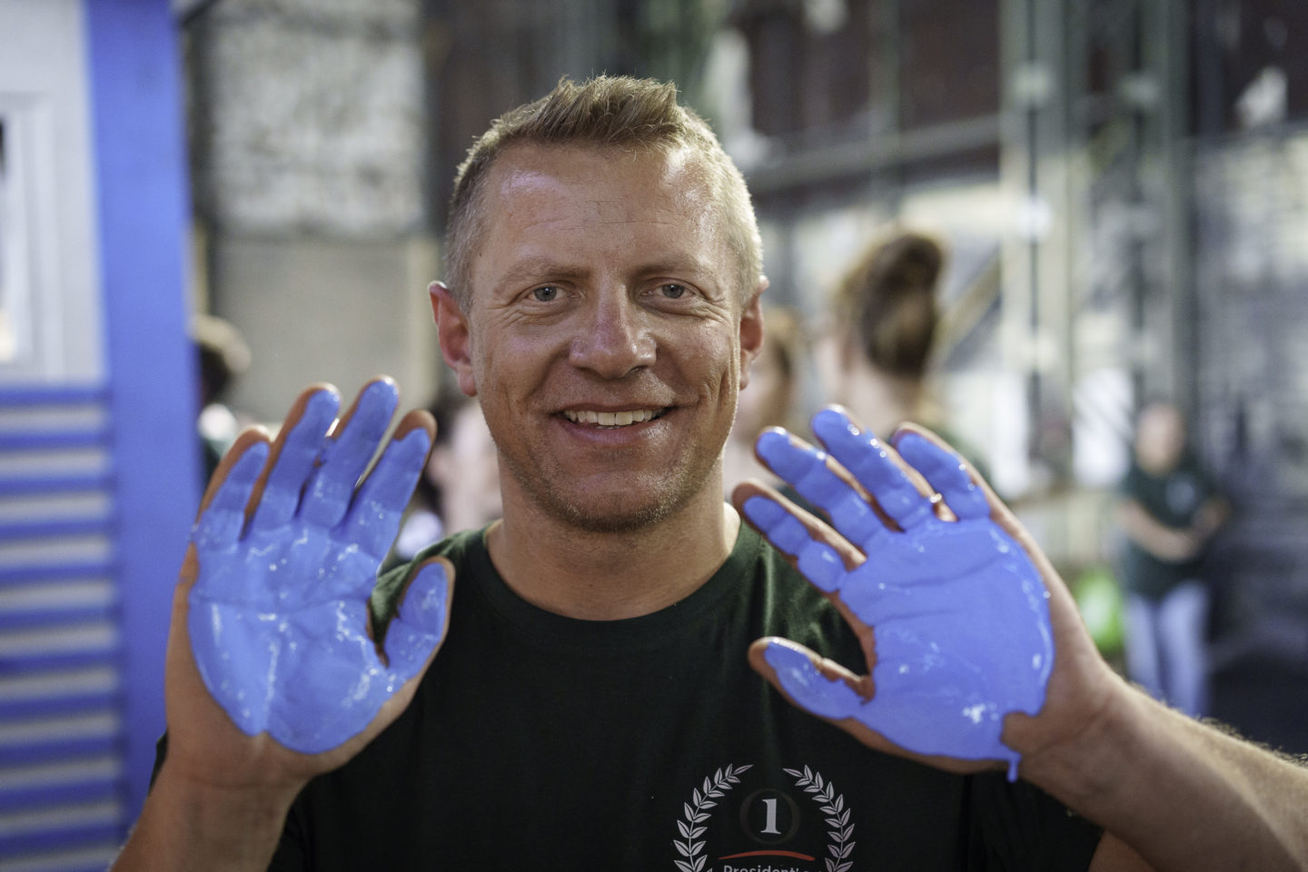 Berlin Man with painted blue hand