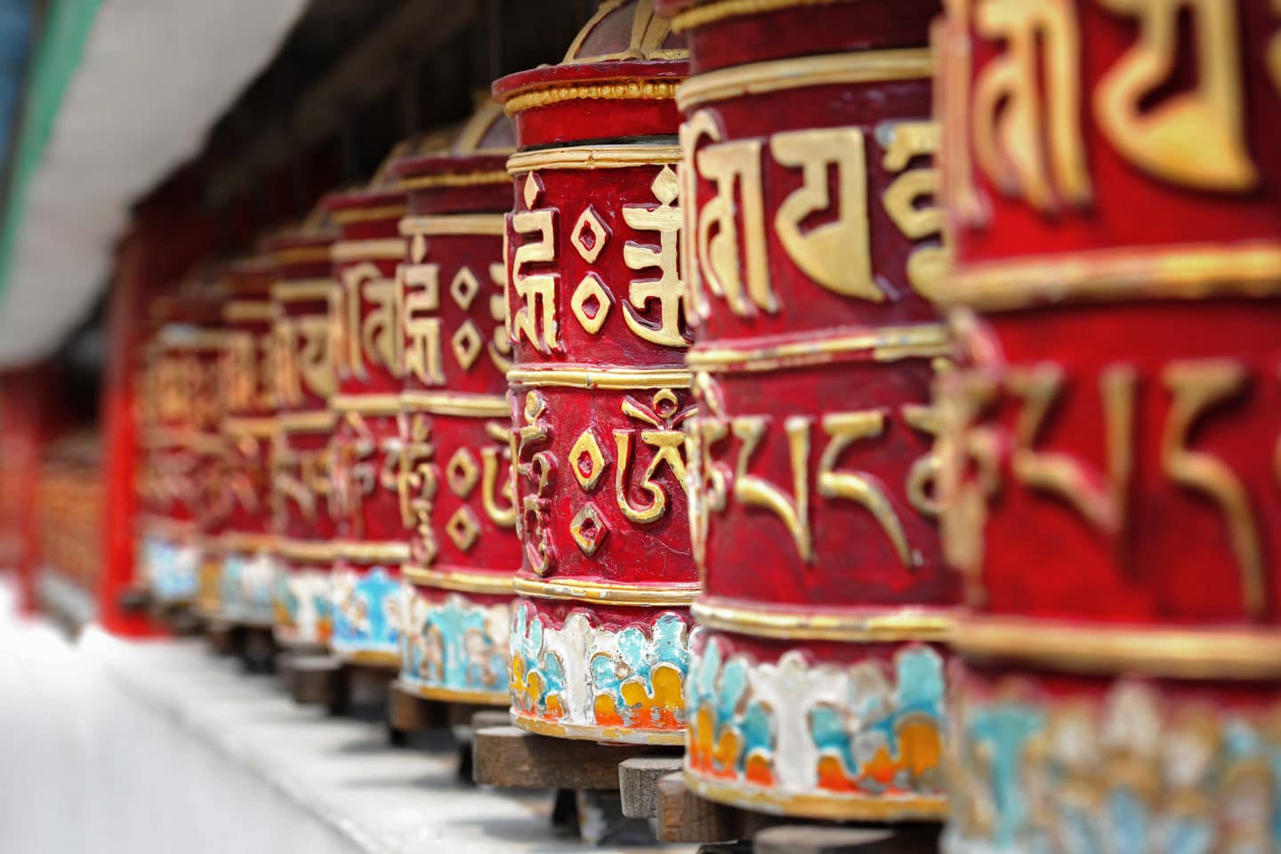Red prayer wheels in a Monastery of Bhutan