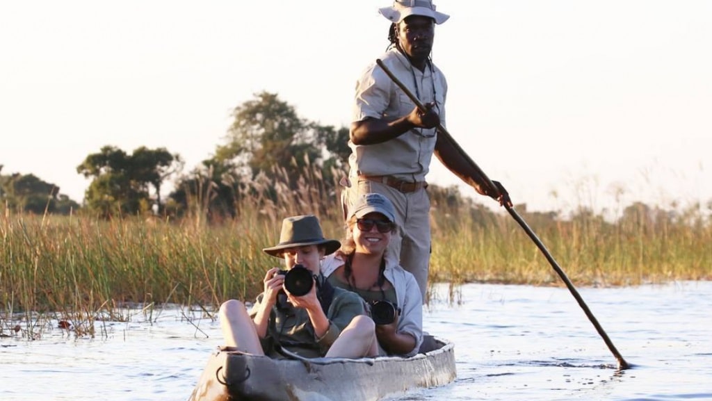 Botswana Mokoro Ride photographing in Chobe River