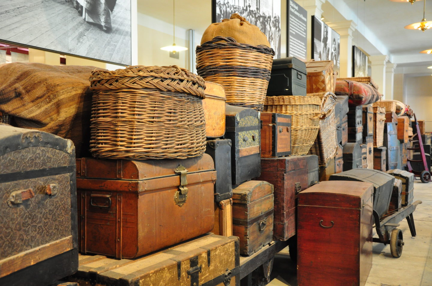 Vintage luggage left by immigrants migrating to the United States at Ellis Island Immigration Museum