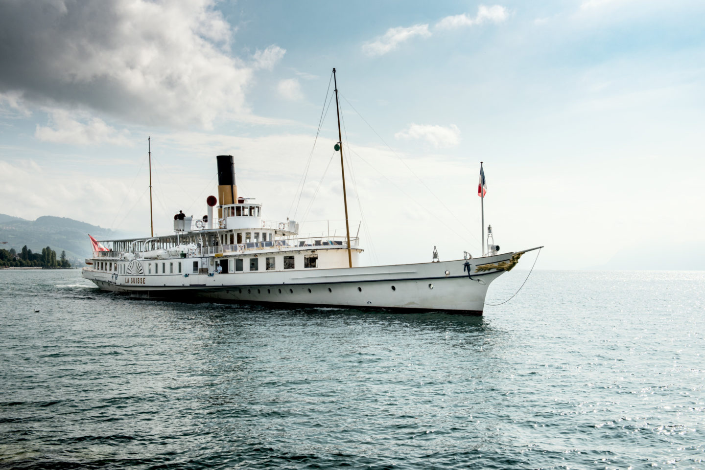 Switzerland's paddle steamer La Suisse gracefully navigating Lake Geneva, Lac Léman.