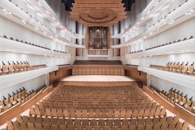 A large auditorium showcasing a multitude of seats.
