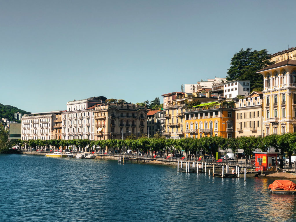 Scenic view of Italian lake with charming buildings in the background