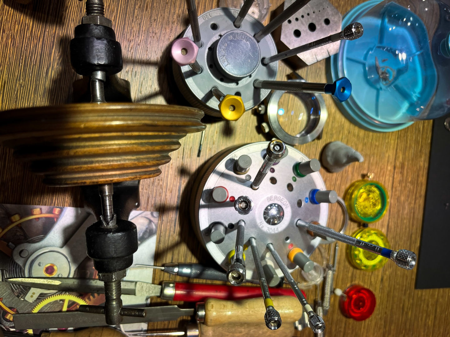 A table displaying a collection of tools and miscellaneous items