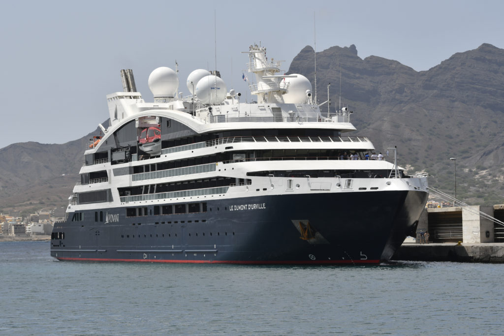 Exterior view of the ship Le Dumont d'Urville off the coast.