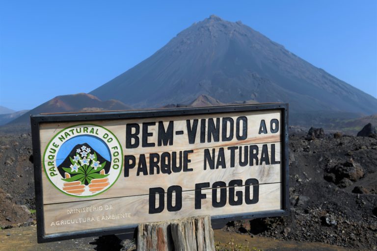 The sign stands in front of the volcano on the island of Fogo in Cape Verde.