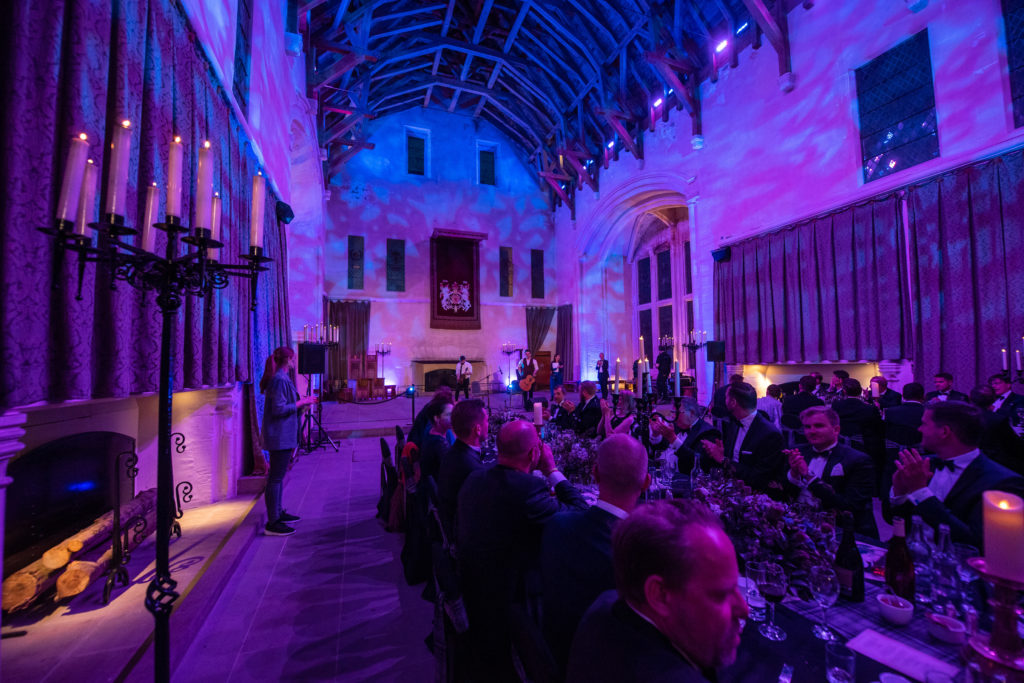 Stirling Castle is colorfully illuminated for the gala dinner on the last evening of an event in Scotland.