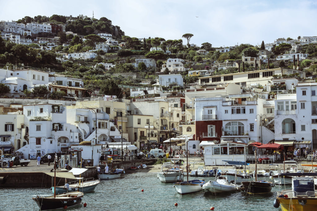 View of the promenande with boats in Capri in Italy.