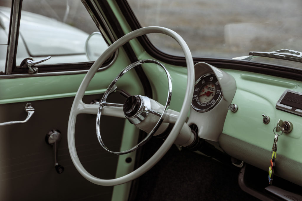 A Fiat 500 is parked before guest arrive for a ride along the Amalfi coast.