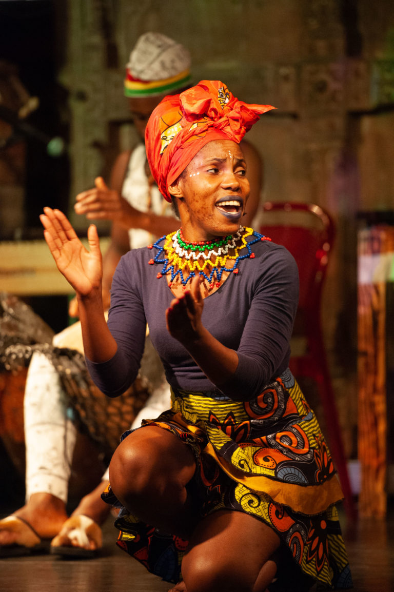 A lady singing on stage in Cape Town.