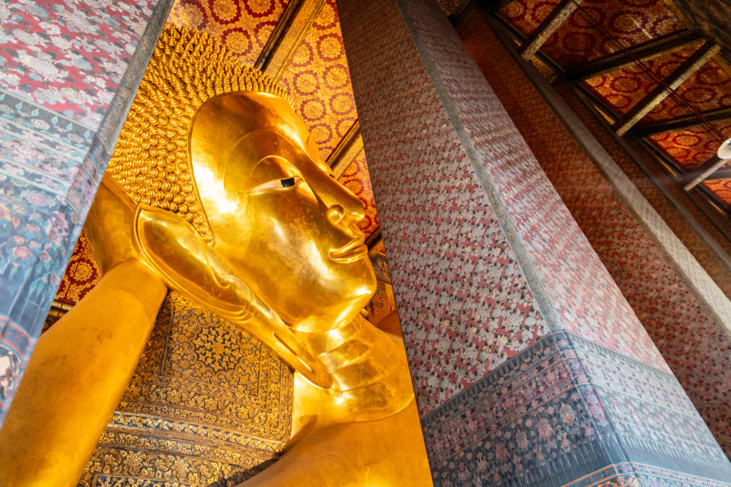 A close-up of the reclining Buddha Wat Pho in Bangkok.