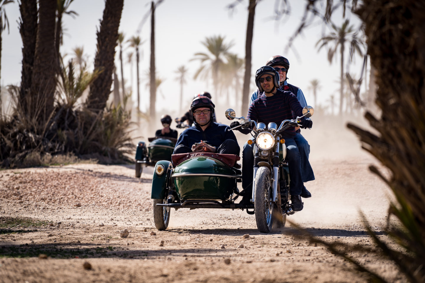 A man smiles during a motorcycle sidecar excursion at a corporate event in Marrakech, Morocco