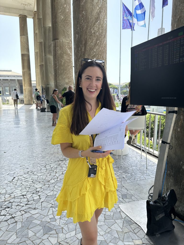 Melissa from the events team smiles as she greets her guests during an event in Rome, Italy.