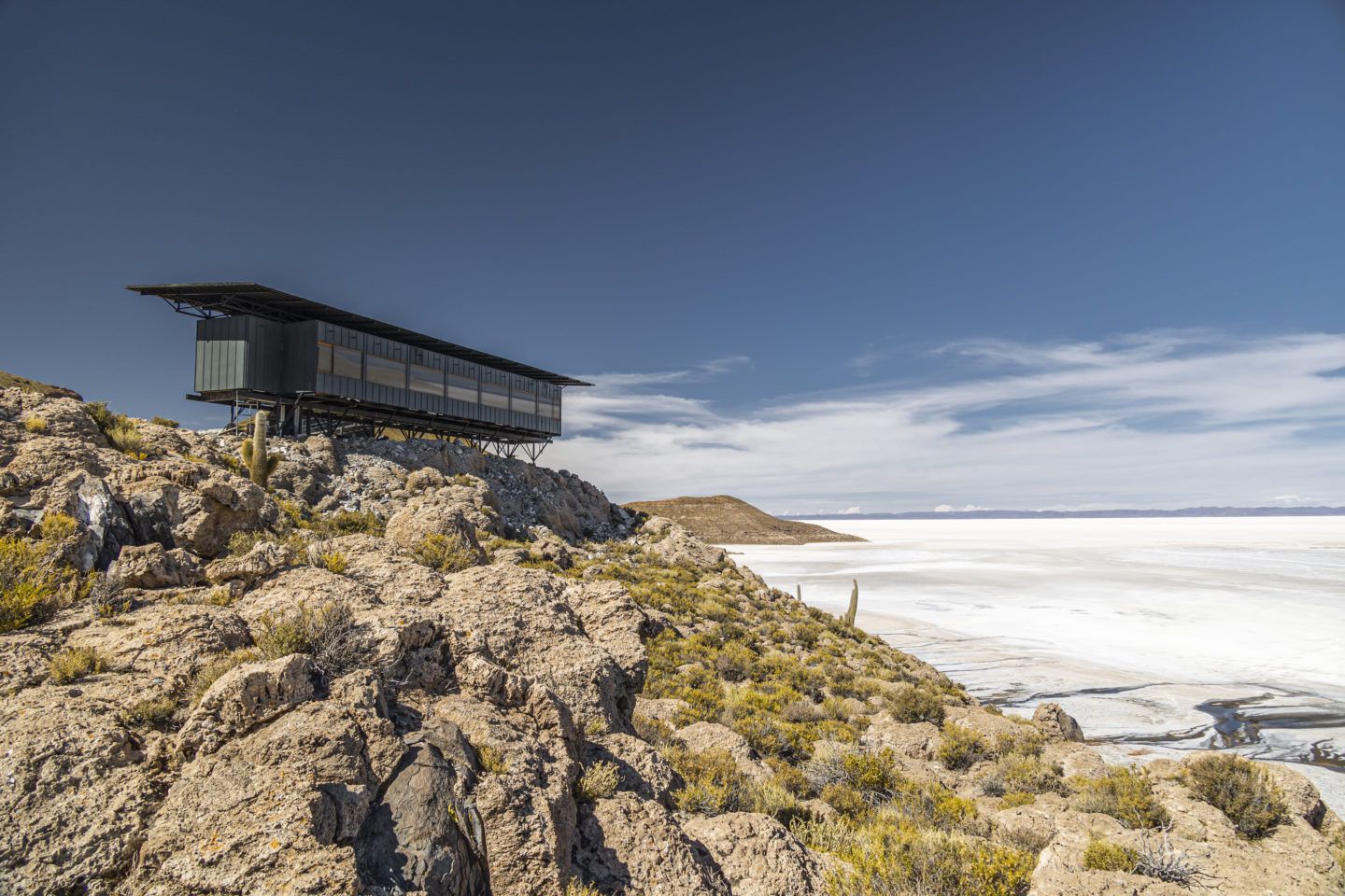 A luxurious lodge overlooking the vast expanse of the Salar de Uyuni salt flat