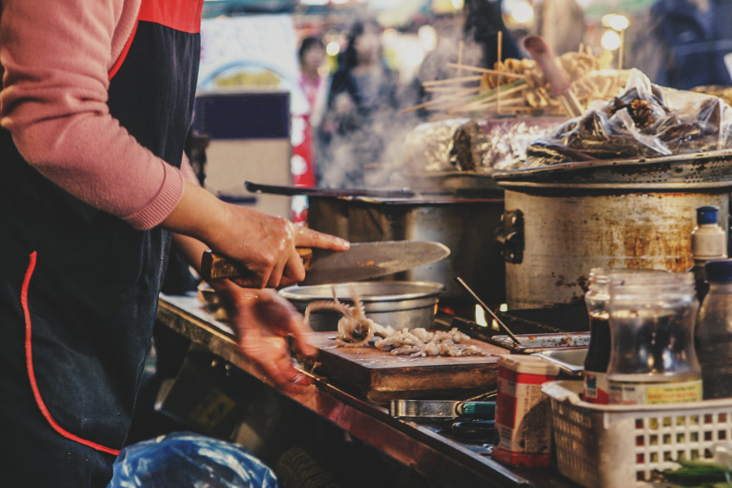 Korean street food delights with flavors like spicy tteokbokki.