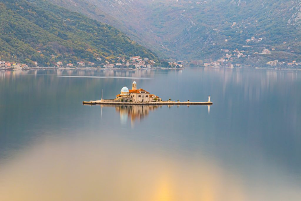 Our Lady of the Rocks island church in the still waters of Montenegro’s Bay of Kotor.
