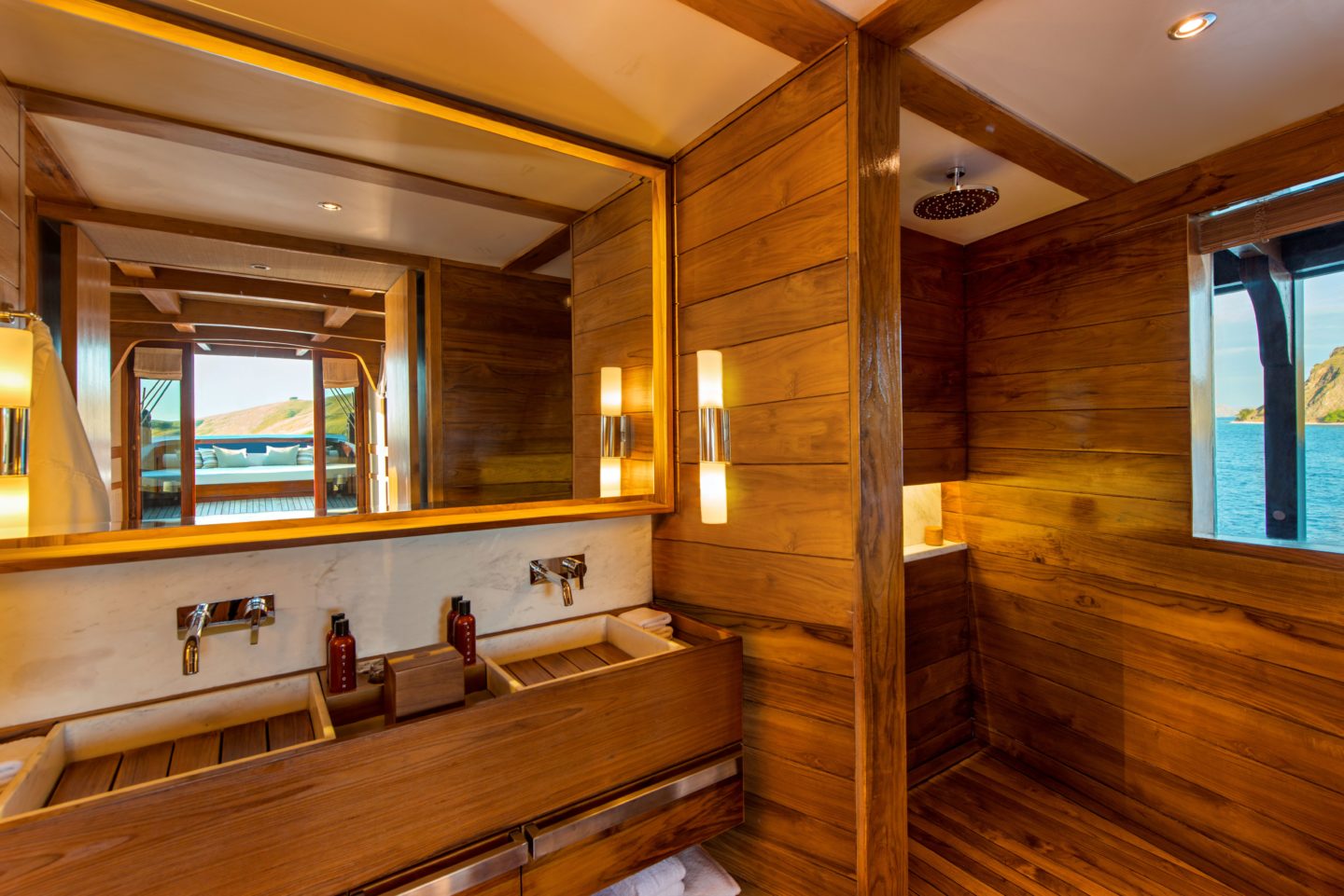 Bathroom featuring a wooden wall and a sink, designed for luxury on the Amandira yacht